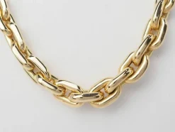 Collier maille forcat limée en chute en or jaune et diamant