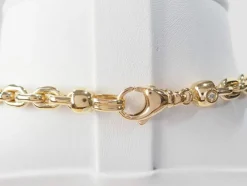 Collier maille forcat limée en chute en or jaune et diamant