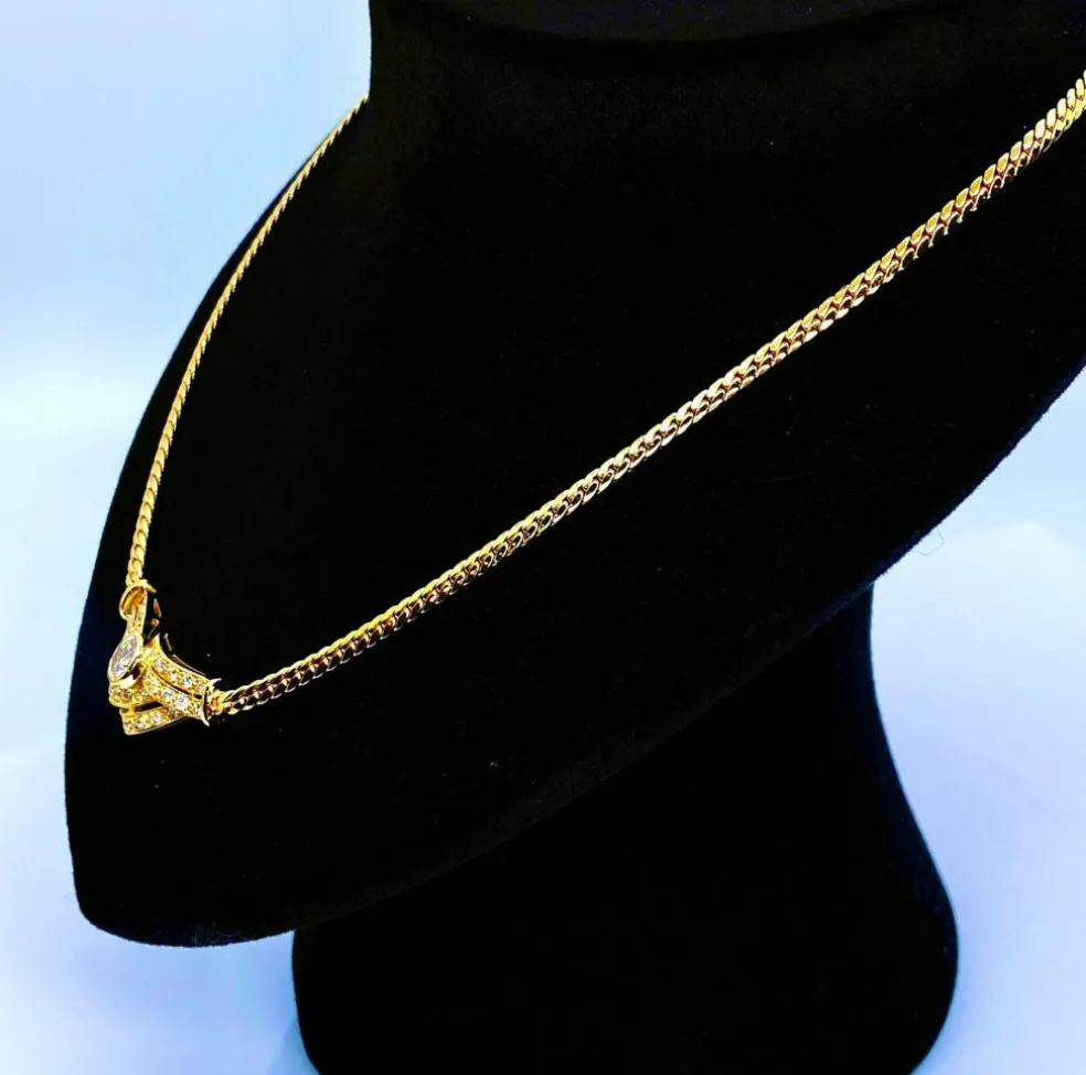 Collier motif central diamants