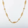 Collier motifs filigranés