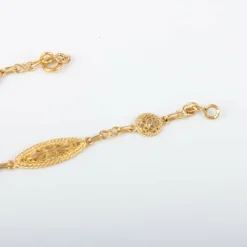 Collier motifs filigranés