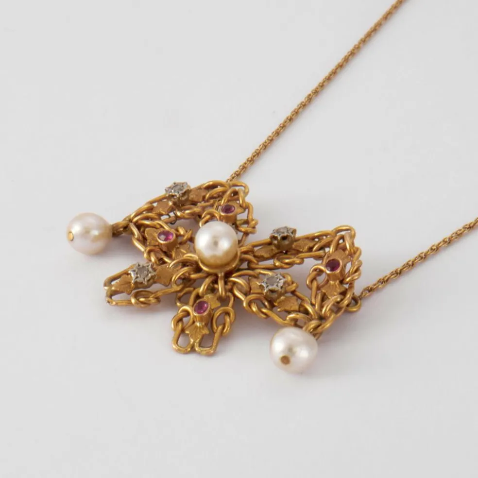 Collier nœud en Or jaune, perles & diamants