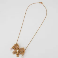 Collier nœud en Or jaune, perles & diamants