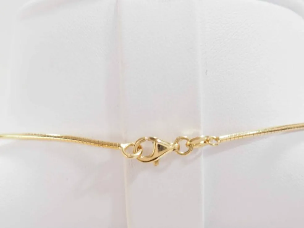 Collier Oméga en or jaune