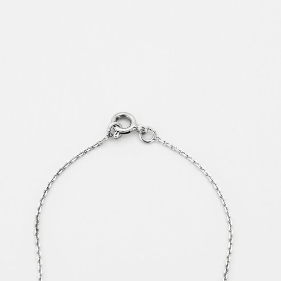 Collier or blanc 18 carats sertie d'un diamant princesse