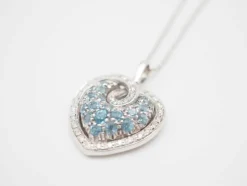 Collier or blanc avec pendentif coeur Diamants et Topaze