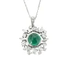 Collier or blanc, émeraude et diamants