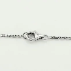 Collier or blanc, émeraude et diamants