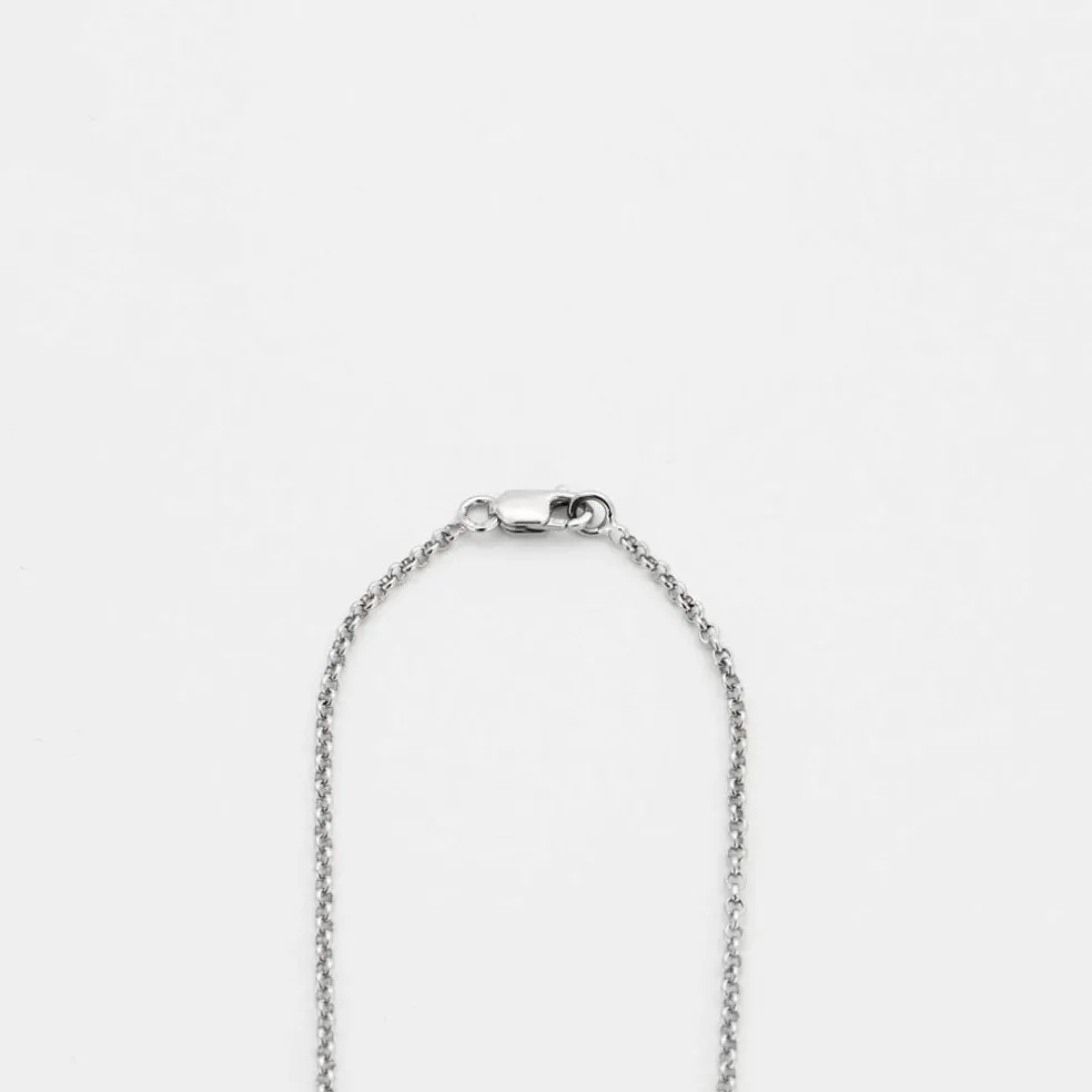 Collier or gris, diamants et tanzanite