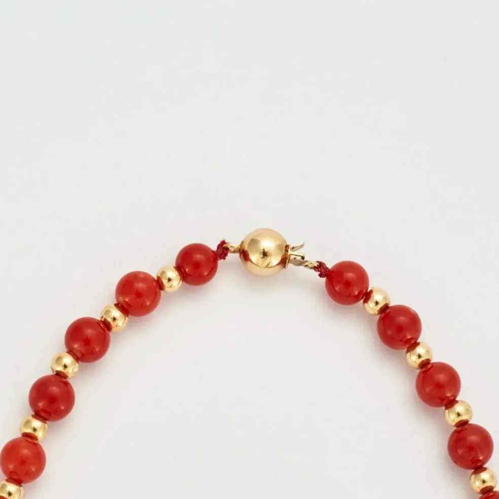Collier or jaune billes de corail