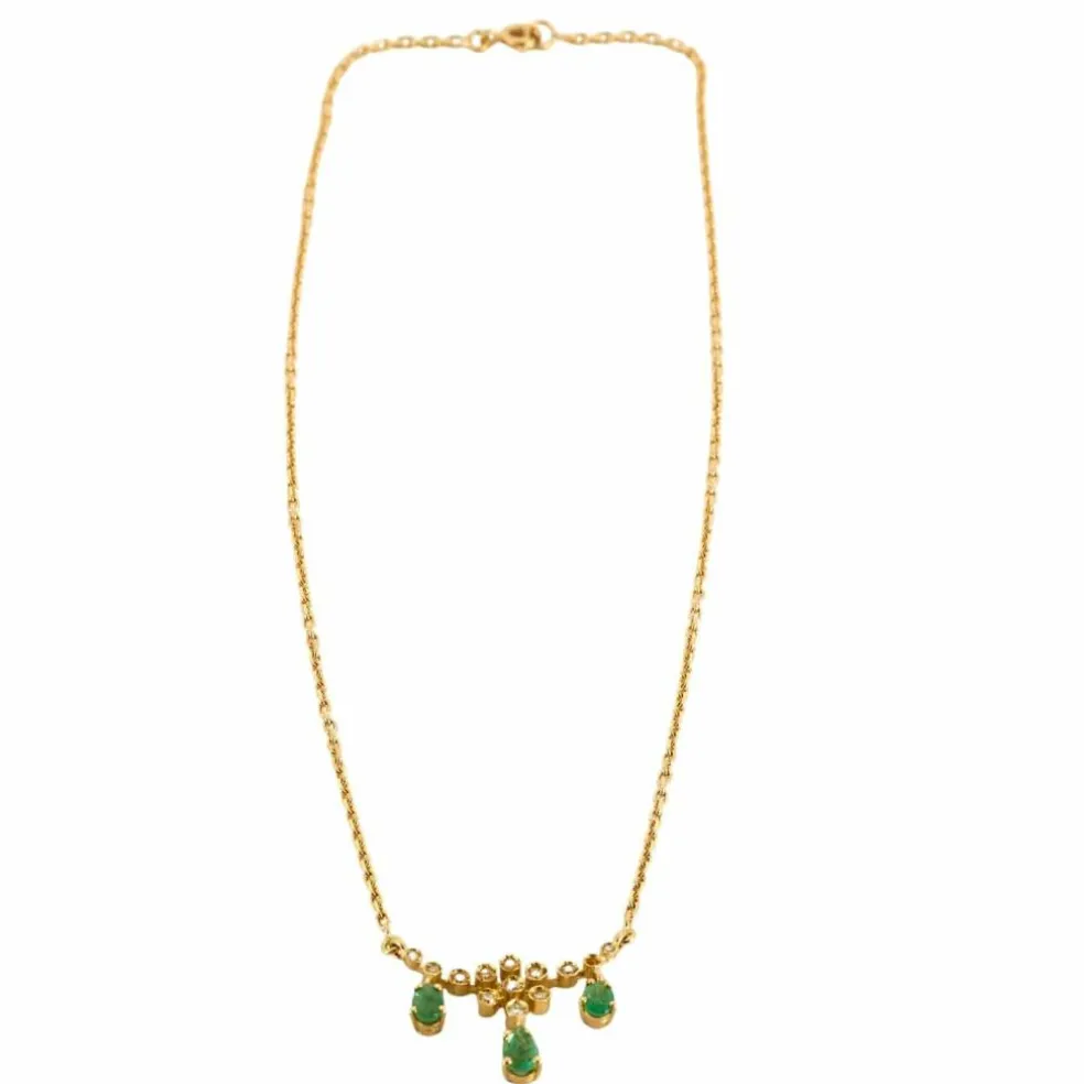 Collier or jaune diamants émeraudes