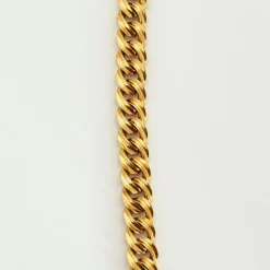Collier or jaune diamants centré d'une pièce de bronze