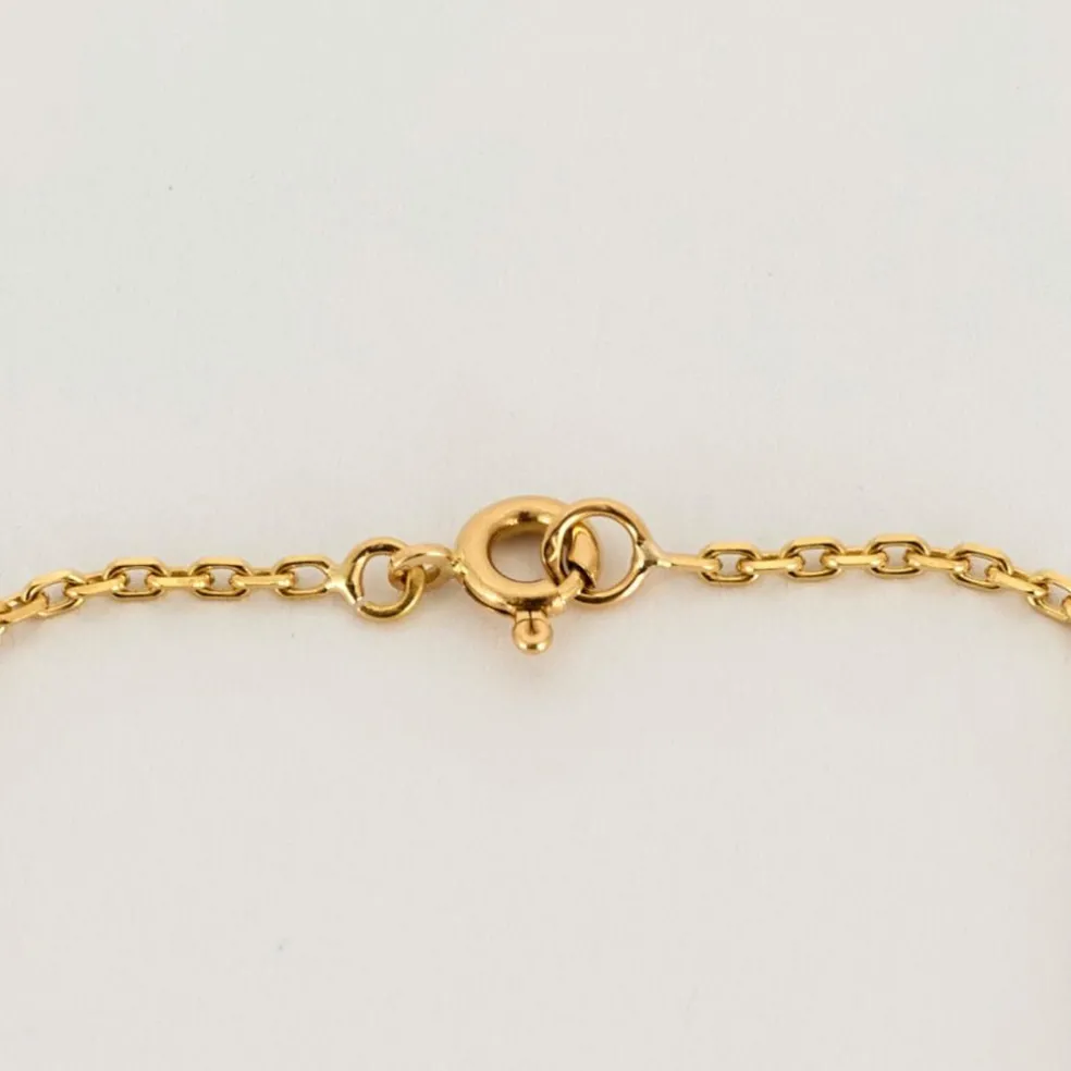 Collier or jaune diamants émeraudes