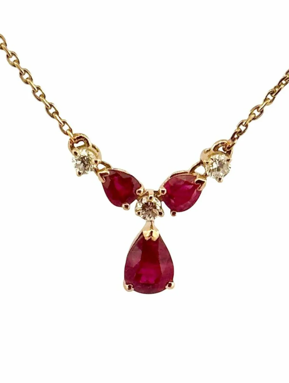 Collier or jaune, diamants et rubis poires