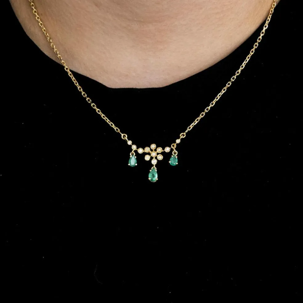 Collier or jaune diamants émeraudes