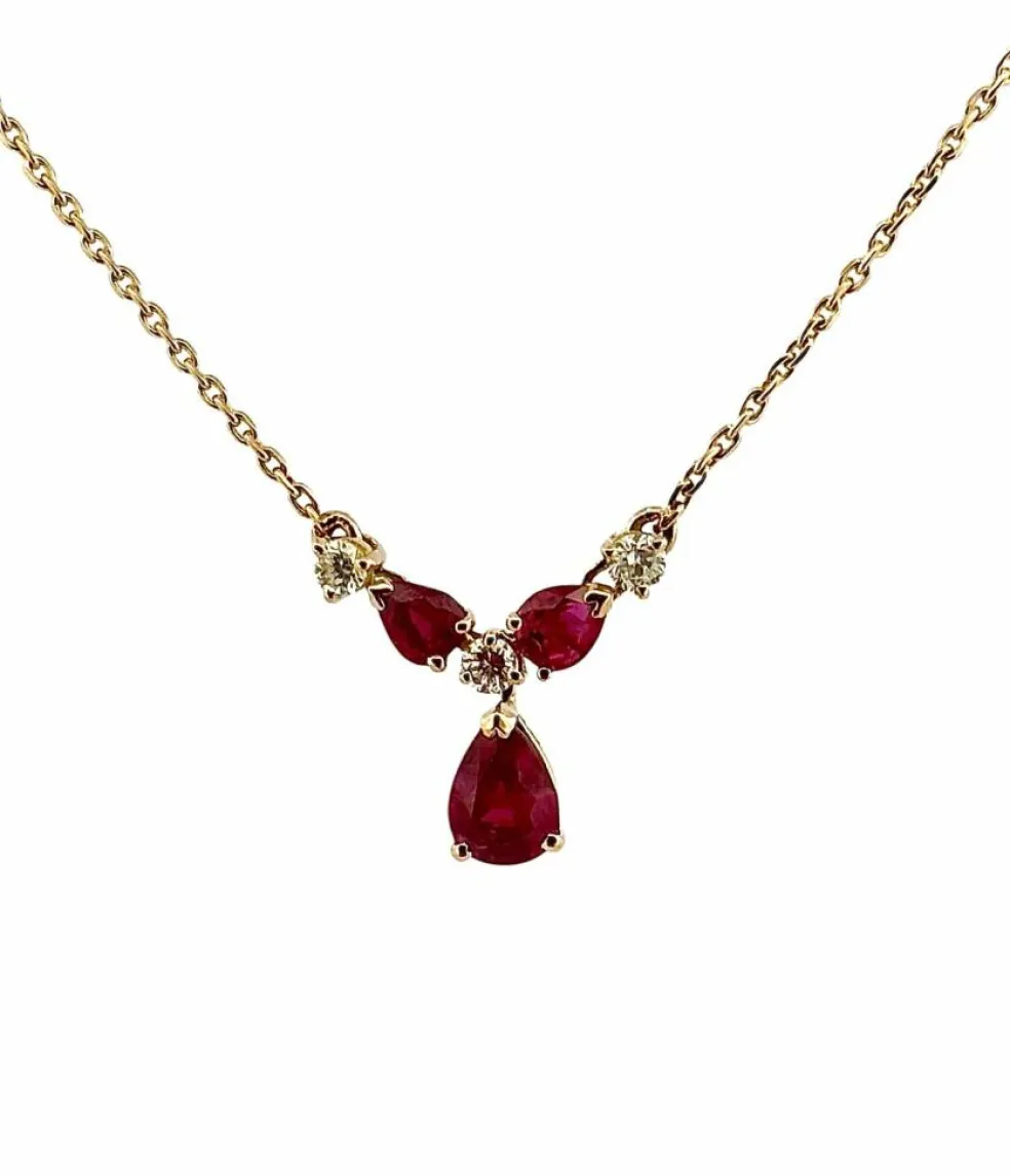 Collier or jaune, diamants et rubis poires
