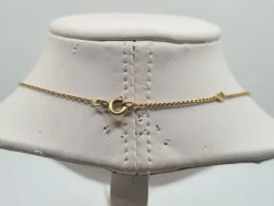 Collier or jaune diamants rubis