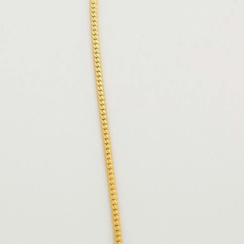 Collier or jaune maille cobra saphir