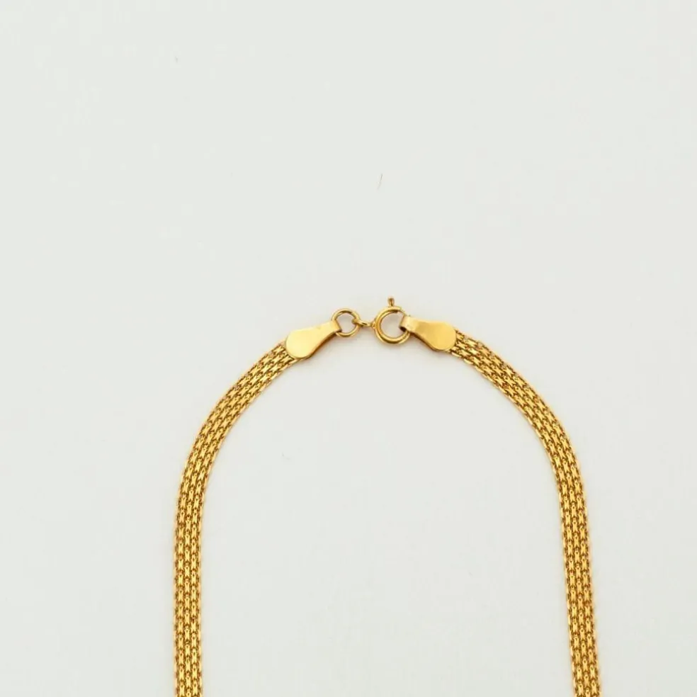 Collier or jaune maille paillasson