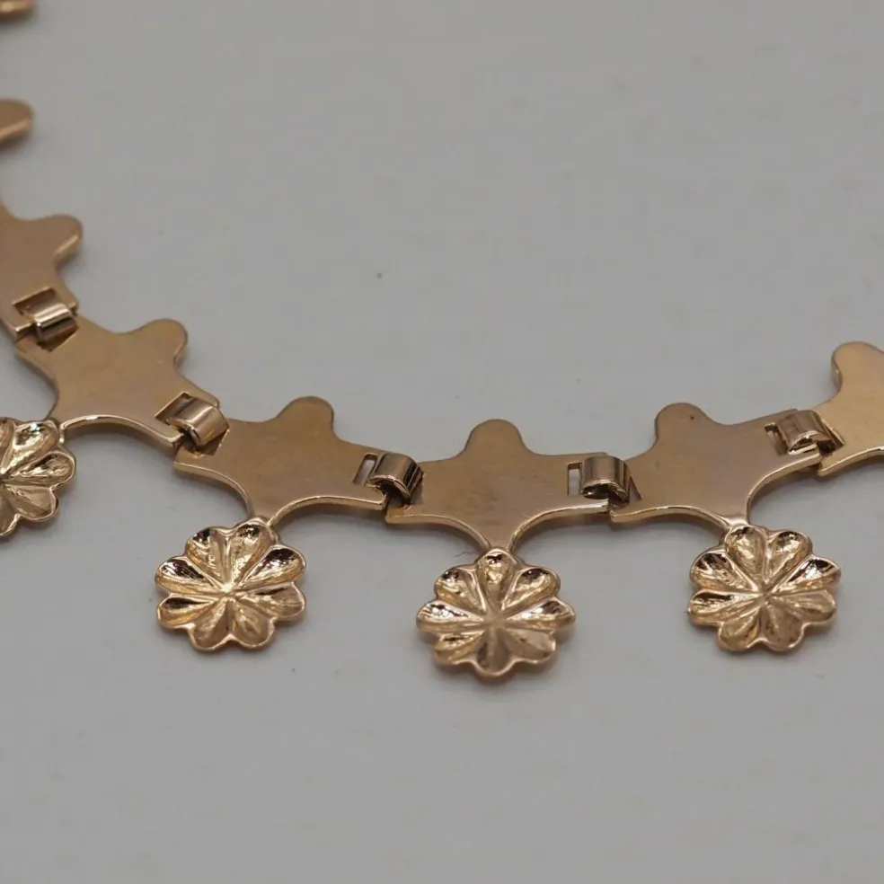 Collier or jaune motif fleur