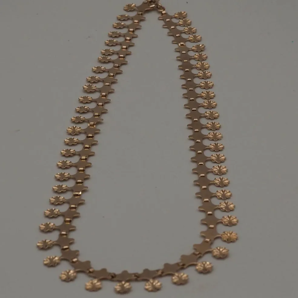 Collier or jaune motif fleur