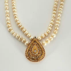 Collier or jaune perle et diamants