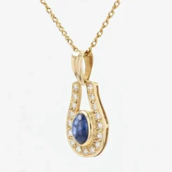 Collier or jaune saphir diamants
