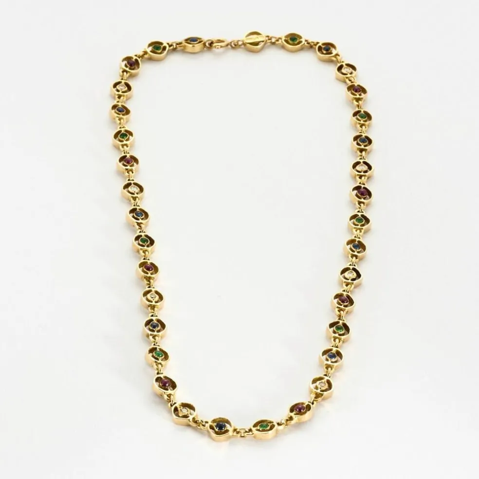 Collier or jaune, saphir, émeraudes et rubis