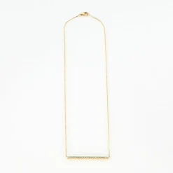 Collier or jaune serti d’une barrette de diamants naturels