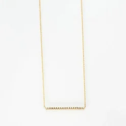 Collier or jaune serti d’une barrette de diamants naturels