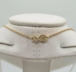 Collier or jaune serti d'une tourmaline et de diamants