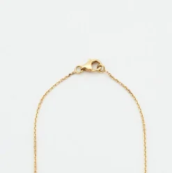 Collier or jaune serti d’une barrette de diamants naturels