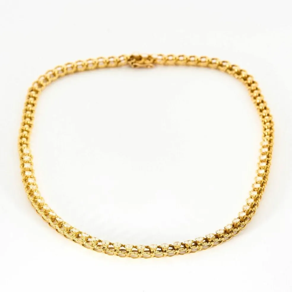 Collier or jaune texturé et diamants