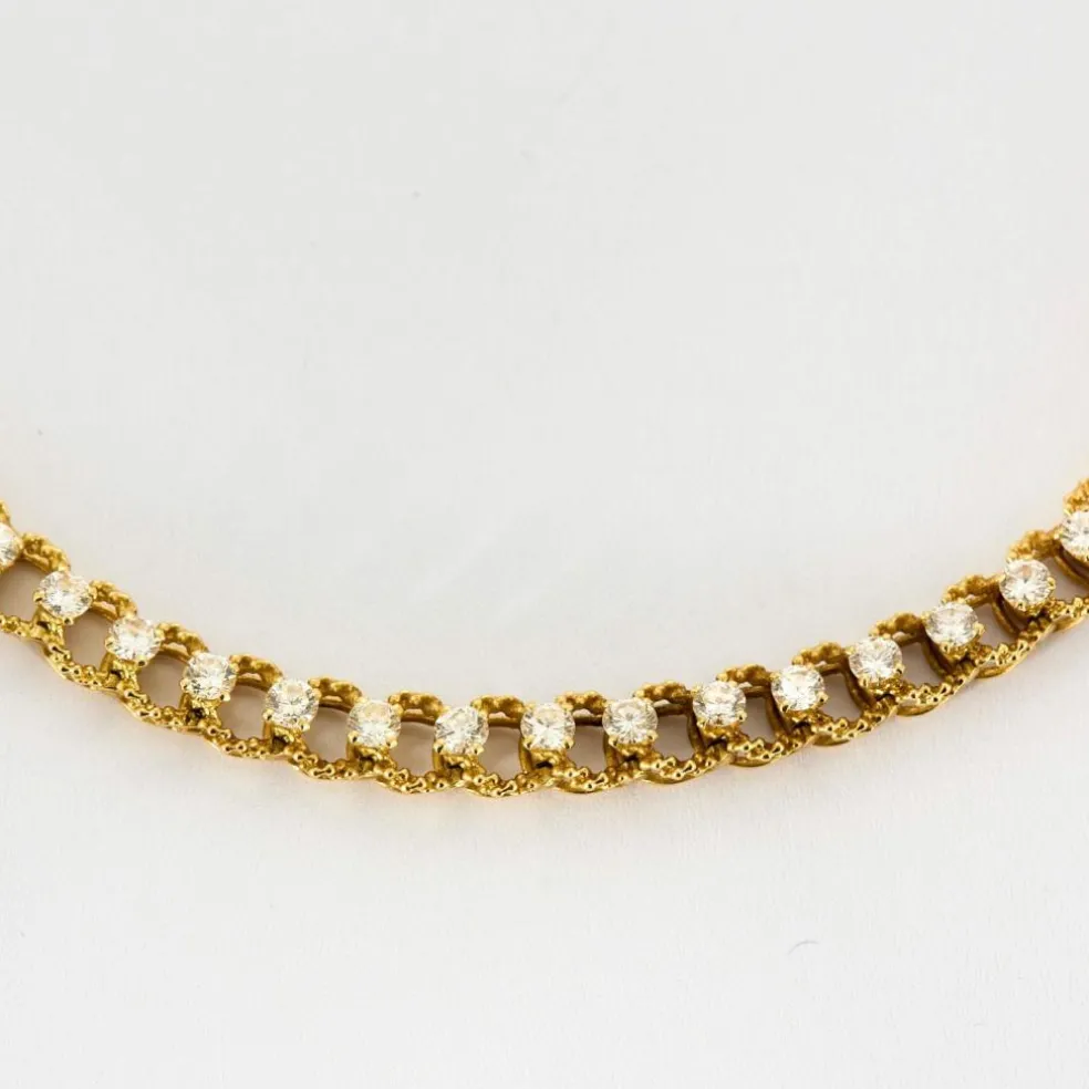 Collier or jaune texturé et diamants