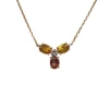 Collier or rose serti de saphirs et d'un diamant