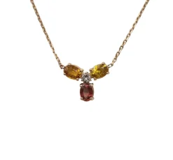Collier or rose serti de saphirs et d'un diamant