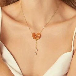 Collier Papillon en or jaune, quartzites pêche tourmalines et diamants