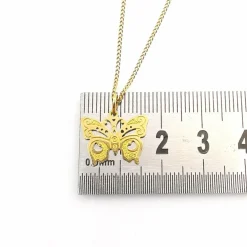 Collier papillon or jaune