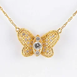 Collier papillon or jaune et diamants