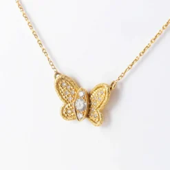 Collier papillon or jaune et diamants