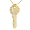 Collier pendentif clé en or et diamant