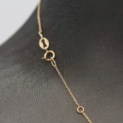 Collier pendentif croix en or et diamants