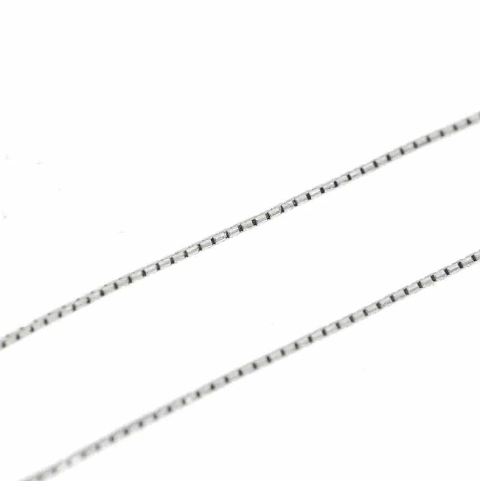 Collier pendentif croix et diamants