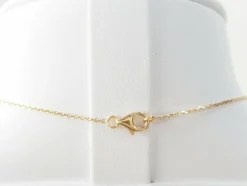 Collier pendentif en or jaune et grenats