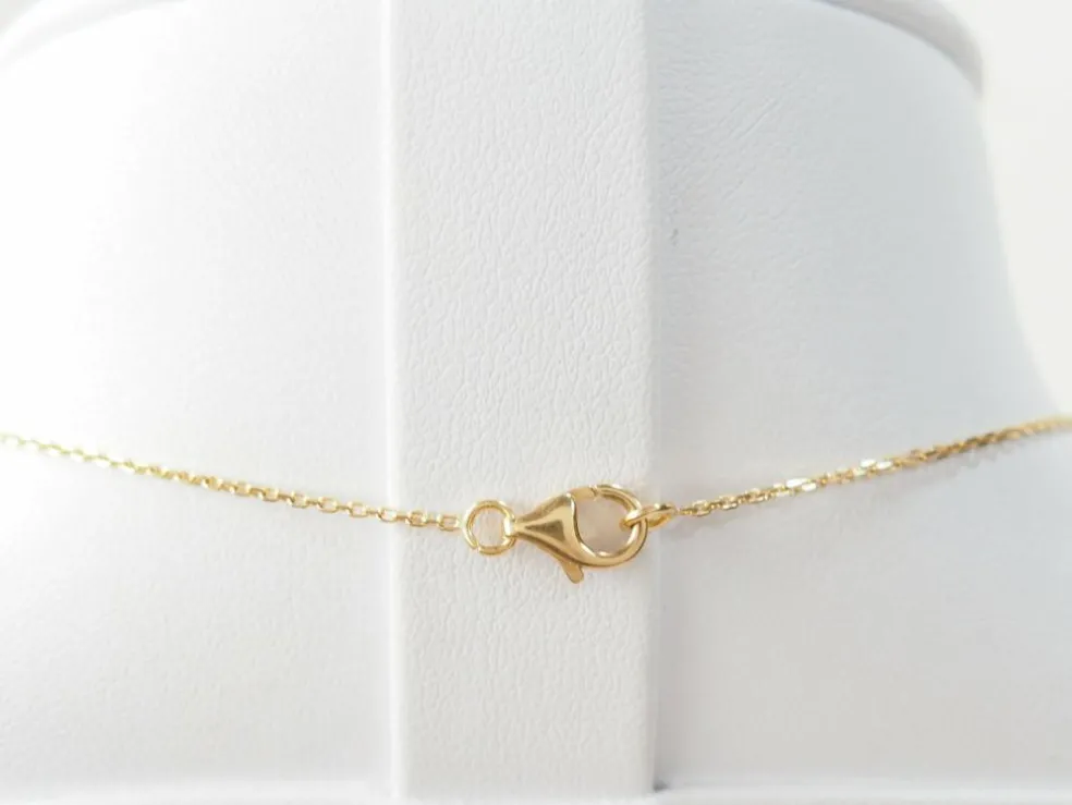 Collier pendentif en or jaune et grenats