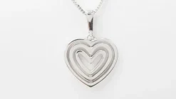 Collier pendentif multi coeurs or blanc diamants