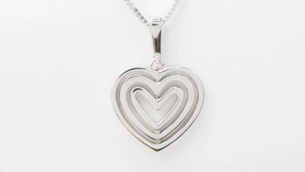 Collier pendentif multi coeurs or blanc diamants