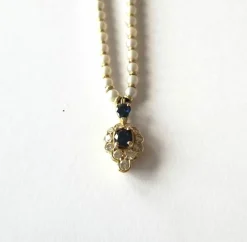Collier perles de culture et or jaune saphirs et diamants