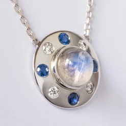 Collier pierre de lune saphirs diamants