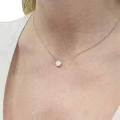 Collier solitaire deux ors, diamants.